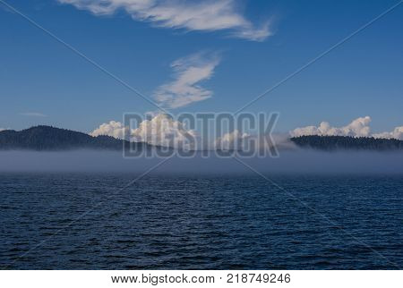Sea smoke on the bay. Sea smoke is surface fog that appears over the ocean when it is very cold out.