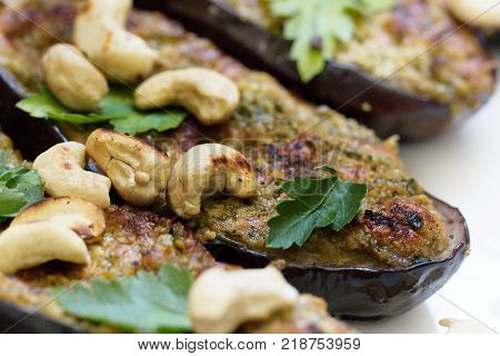 Grilled spisy eggplants. grilled eggplants with garlic yogurt sauce and walnuts