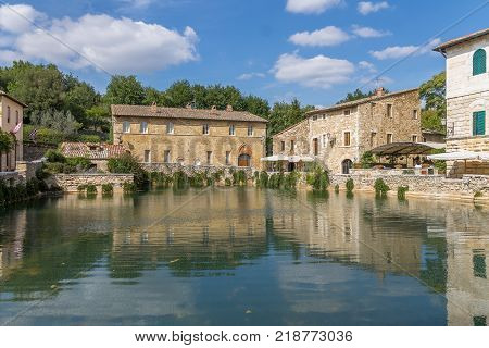 Old thermal baths in the medieval village Bagno Vignoni, Tuscany, Italy