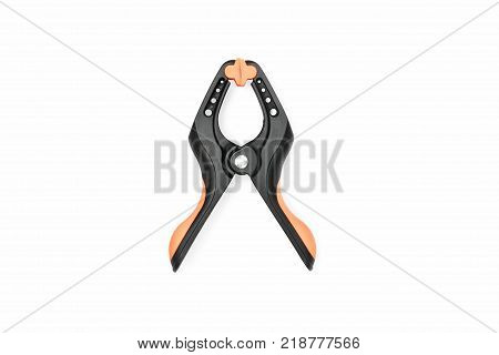 Large plastic clip with orange lips isolated on white background