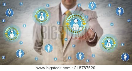 Unrecognizable manager initiating conference call with two female and two male white collar colleagues in cyberspace. Concept for peer to peer network wireless digital communication and IT support.