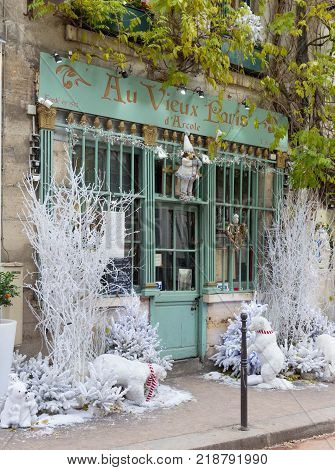 Paris, France-September 27, 2016 : The old traditional French cafe Au vieux Paris d'Arcole decorated for Christmas located in a touristy area, near Notre Dame cathedral, on Cite island.