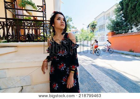 Young Georgian woman in old town looking forward