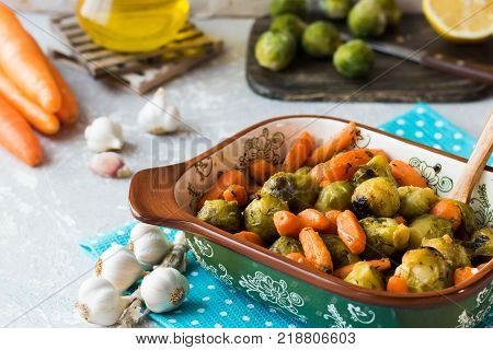 Useful and dietary dinner of caramelized brussels cabbage and carrots