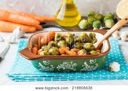 Useful and dietary dinner of caramelized brussels cabbage and carrots