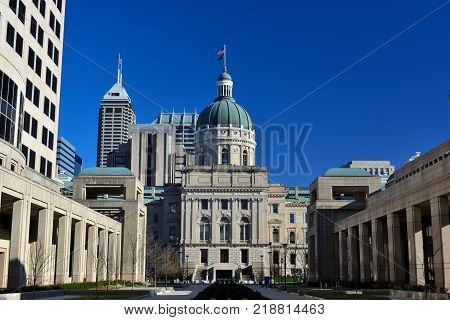 Indiana Statehouse Capitol Building on a Sunny Day with the Indianapolis Skyline