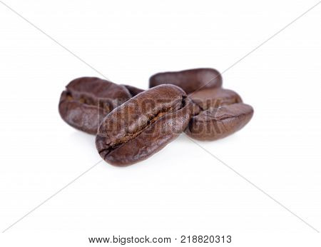 roasted coffee beans arabica strong blend on white background