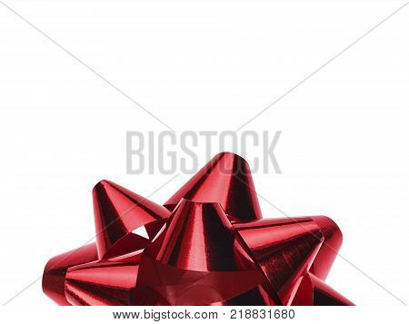 A holiday symbol, an element of decor. Red bow isolated on white background.