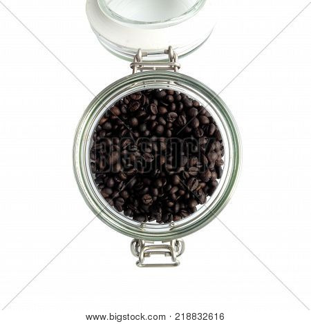 Coffee beans in a glass jar on the white background