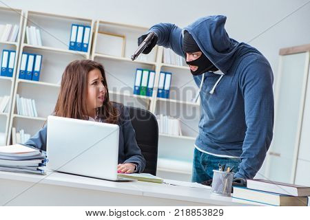Criminal taking businesswoman as hostage in office
