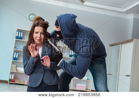Criminal taking businesswoman as hostage in office