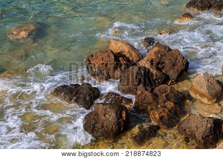 Rocks on the beach on Corfu in Greece