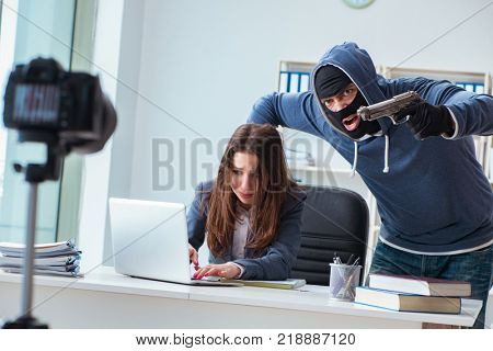 Criminal taking businesswoman as hostage in office