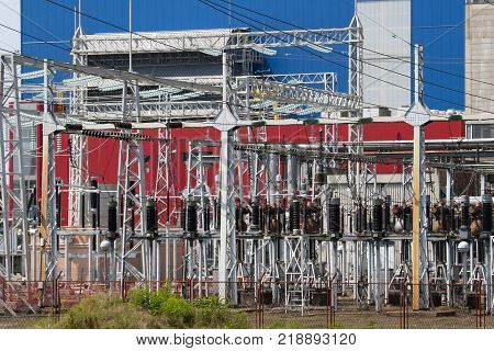 Wires, insulators and electrical poles of power plant Sisak in Croatia
