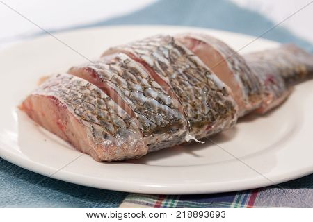 close up Nile tiapia meat cut in pieces