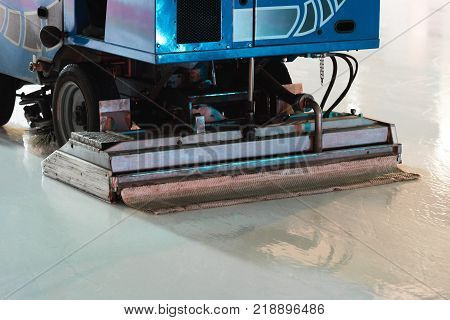 Special machine ice harvester cleaning the ice rink