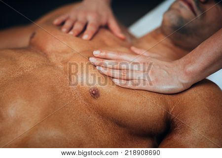 Chest Massage,physical Therapyst Massaging Chest Of Male Athelete