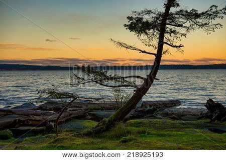 Scenic sunset view of the ocean overlooking the Strait of Georgia from Roberts Memorial Park in Nanaimo, British Columbia.