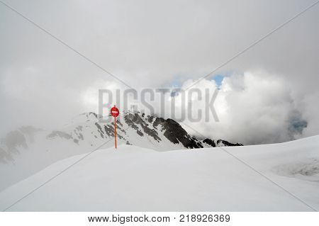 The sign 'No Entry' standing on Mount Aibga at an altitude of 2320 meters above sea level