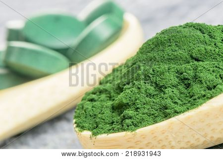 Chlorella spirulina algae in powder - closeup macro shot