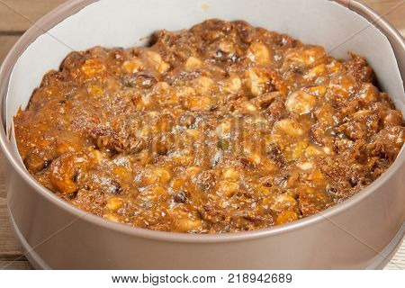 Panforte Preparation, Cooking Process. Baked Mix Of Nuts, Figs, Spices In Baking Tray. Rice Paper