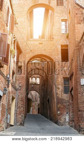 Siena charming narrow streets medieval town in Tuscany Italy