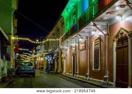 Small street in old town in Phuket town at evening, Thailand.