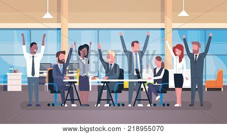 Cheerful Business Team Sitting Together At Desk Happy Group Of Successful Businesspeople With Raised Hands In Modern Office Flat Vector Illustration