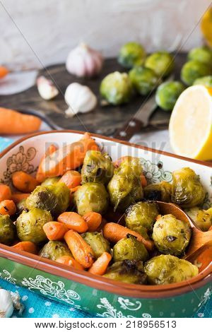 Useful and dietary dinner of caramelized brussels cabbage and carrots