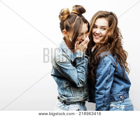best friends teenage girls together having fun, posing emotional on white background, besties happy smiling, lifestyle real people concept close up. making selfie