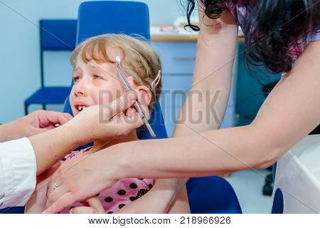 Portrait Of Sweet Little Girl With Glasses