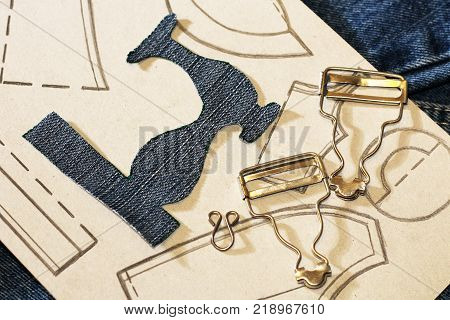 A Stencil Of A Sewing Machine Of Jeans, Drawing Clothing On Paper