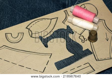 A Stencil Of A Sewing Machine Of Jeans, Drawing Clothing On Paper