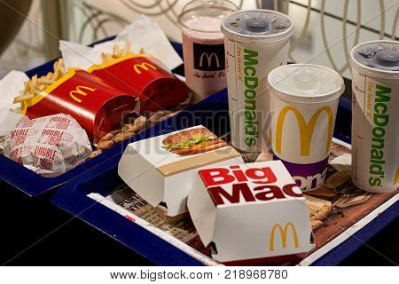 Brno, Czech Republic, October 14, 2017, McDonald´s menu on two blue plates.