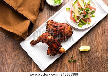 Tandoori Chicken Platter, popular north indian non vegetarian  food, usually served in restaurant