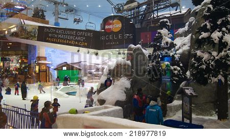 DUBAI, UNITED ARAB EMIRATES - MARCH 30th, 2014: Alpine ski in Dubai. Ski Dubai is an indoor ski resort with 22, 500 square meters of indoor ski area. It is a part of the Mall of the Emirates.