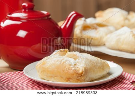 Homebaked Hungarian Cheese Puff Pastry Parcels. Iced Sugar