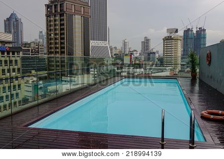 Kuala Lumpur Malaysia - Jan 2 2017. Roof top luxury swimming pool in Kuala Lumpur Malaysia. Kuala Lumpur is the sixth most visited city in the world with 8.9 million tourists per year.