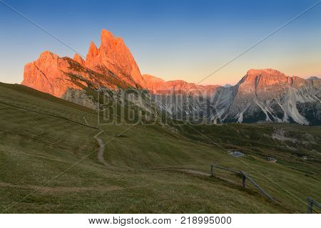 Gardena valley wonderful Seceda peak the Odle mountain range in the Dolomites at sunset in Italy
