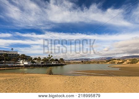 La Charca, bird observation place and nature reserve in Maspalomas in Gran Canaria, Spain. Great place for bird observations. Palm Beach hotel on the left.