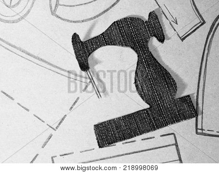 A Stencil Of A Sewing Machine Of Jeans, Drawing Clothing On Paper