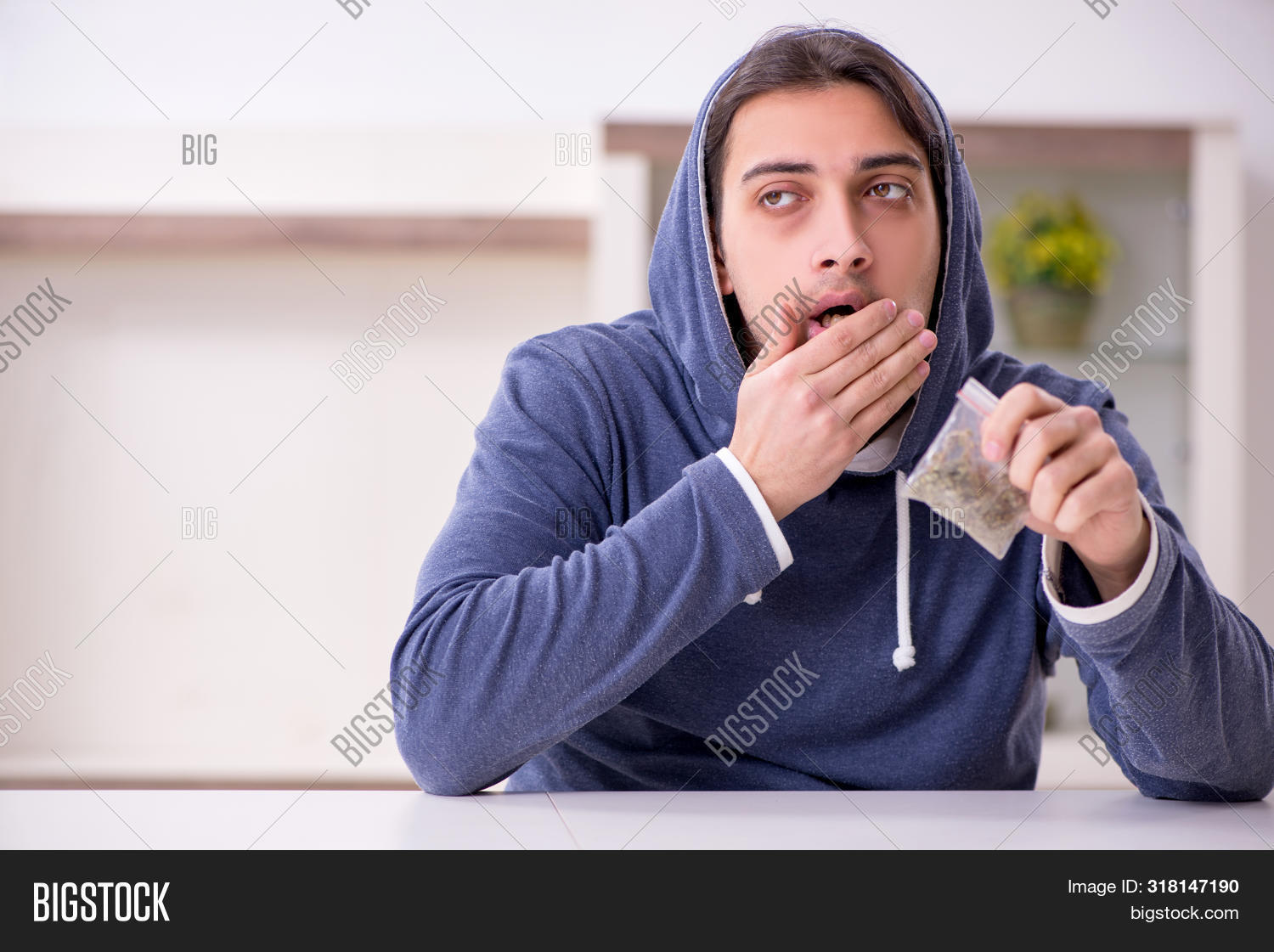 Black Man Sniffing Pizza