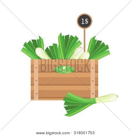 Green Onion With Price Tag In Wooden Grate On White Background.