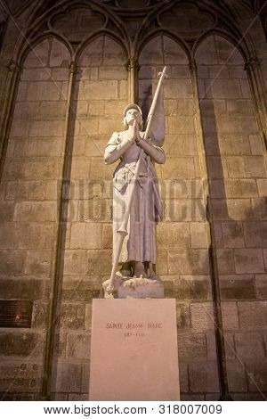 Paris, France - July 22, 2017: A Statue Of Jeanne Darc Inside The Notre Dame Cathedral.