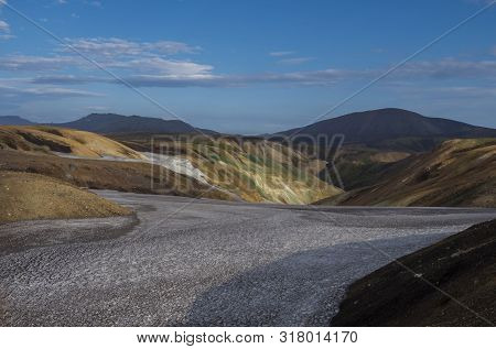 Colorful Rhyolit Mountain Panorma With Snow Fiields And Multicolored Volcanos In Landmannalaugar Are