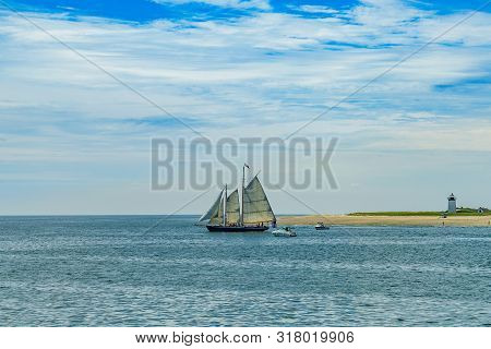 Wo-masted Yacht And Beautiful Landscape Of Ocean Beach Cape Cod Massachusetts
