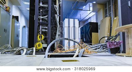 Raised Floor And Suction Tool In Modern Interior Of Server Room In Datacenter