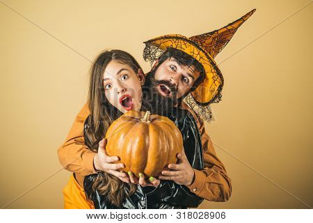 Halloween Couple Embracing. Best Friends Celebrated Halloween. Halloween Surprised Woman And Handsom