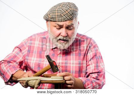 Shoemaker Working With Leather Textile And Hammer At Workshop. Mature Shoemaker In Workshop Make Sho