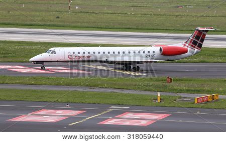 Airplane Taxi In Dusseldorf Airport